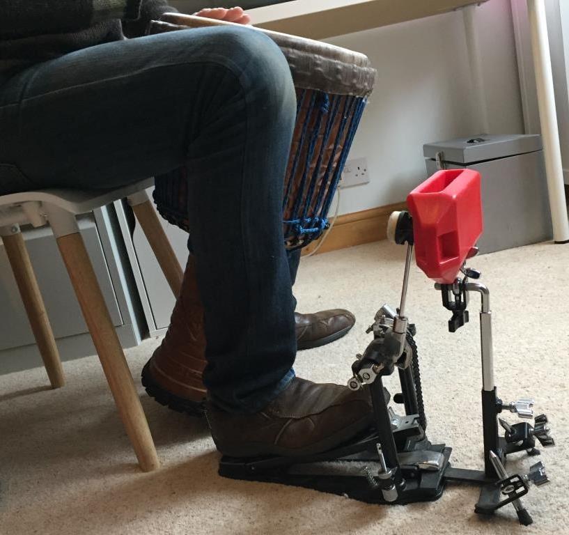 The device I currently use to mark the pulse with my foot when playing. I can't really recall what the device is called but it attaches to a drum pedal to create a sharp consistent clear sound - the clarity of which gets missed with ankle bells.