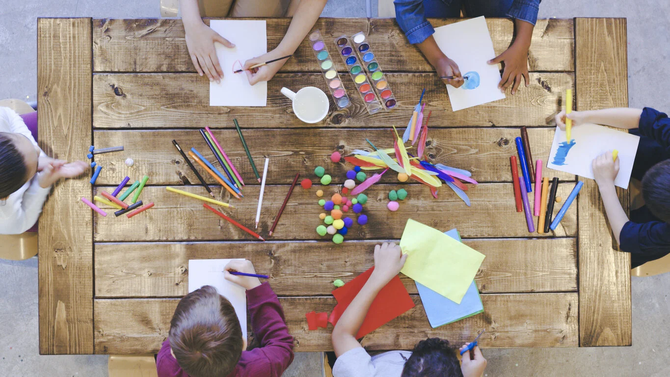 Aerial-view-of-kids-doing-arts-and-crafts-1162045337_1369x770.jpeg