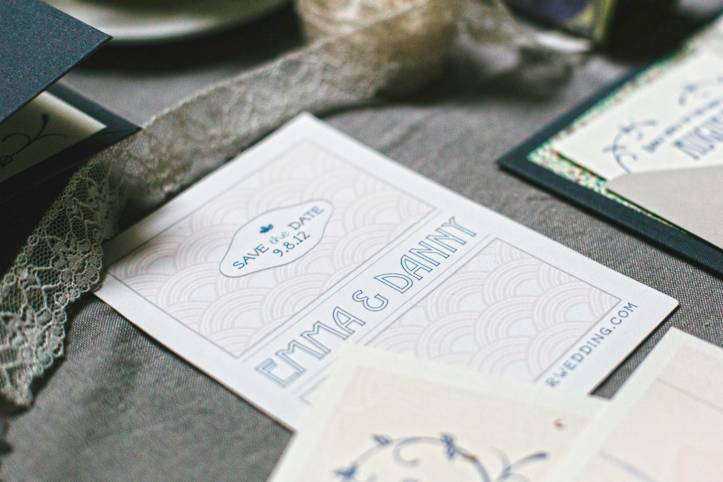  The save the date was a simple postcard with art deco pattern in soft colors.&nbsp; 