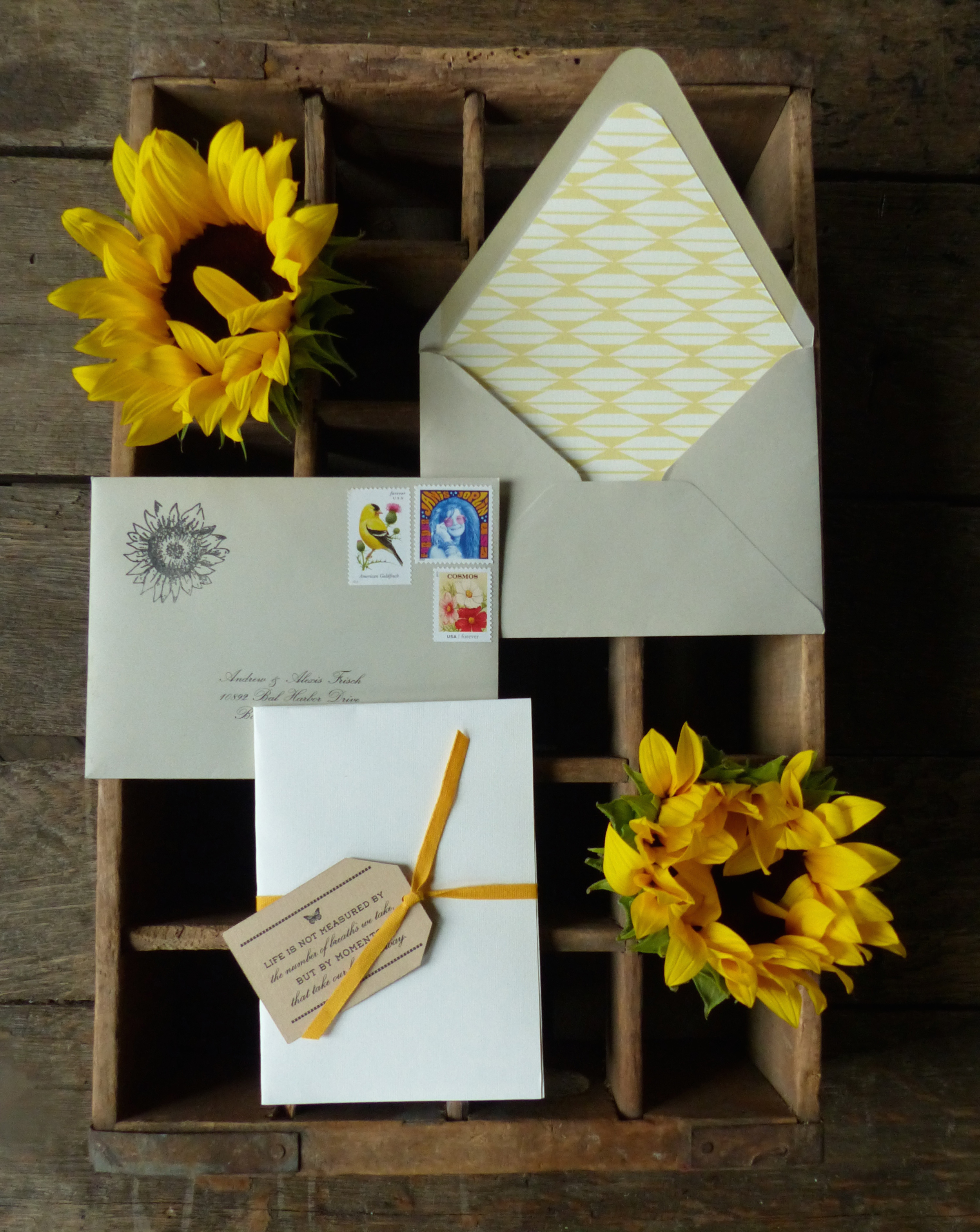  The invitation was delivered folded up inside of a regular old envelope, and bound with a sunny yellow cotton ribbon and tag.&nbsp; 