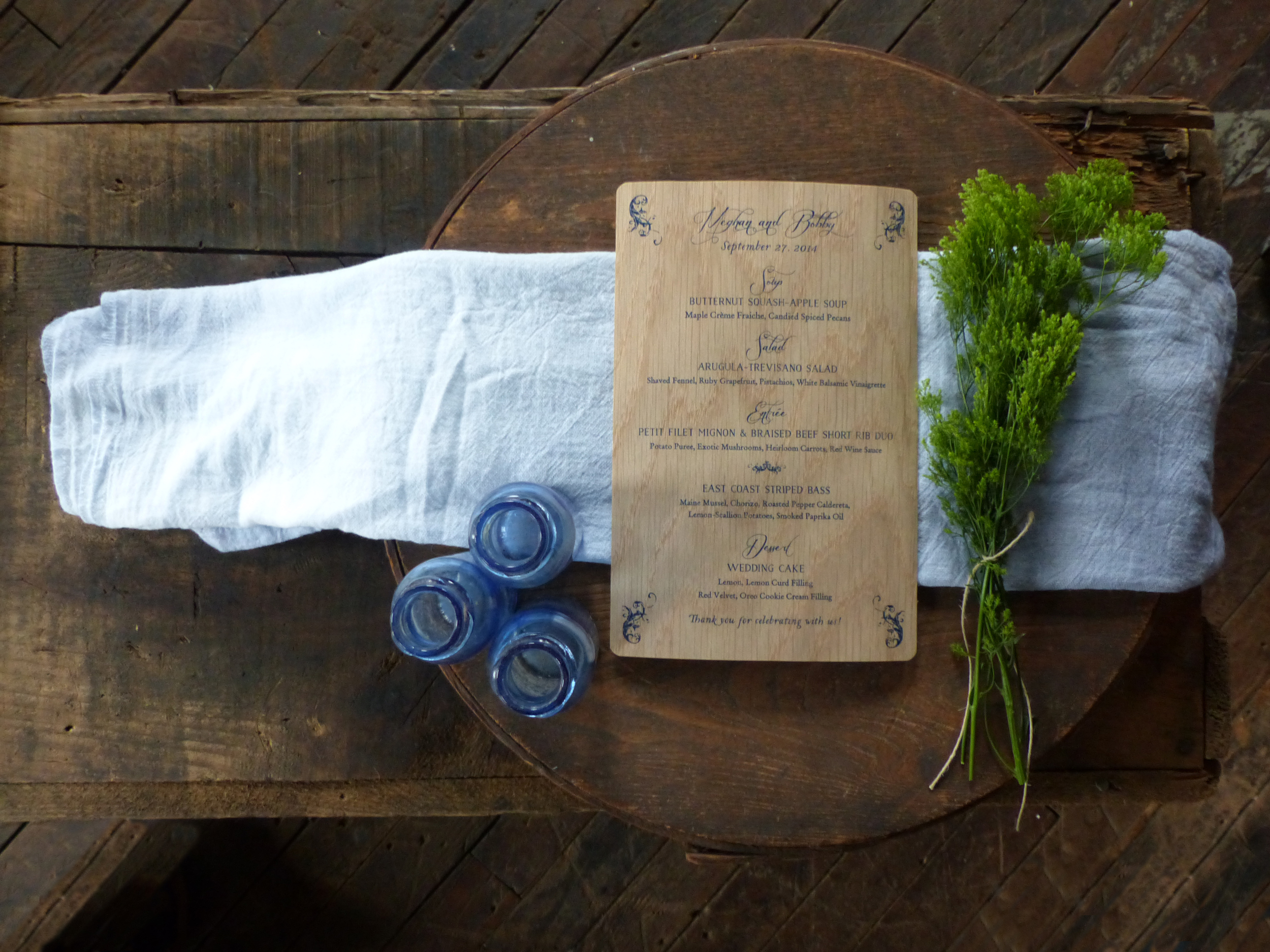  "Day Of Wedding" pieces include a wood printed menu. 