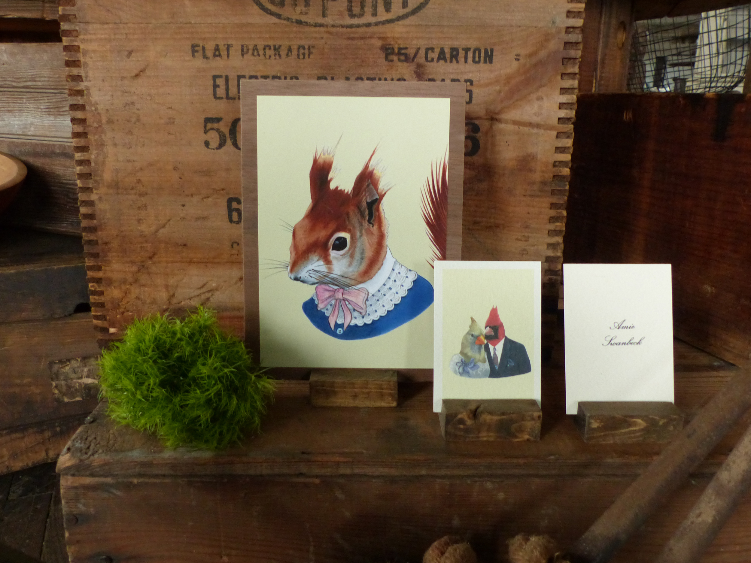  Each table used a picture cue of&nbsp;an illustration of a woodland creature dressed in formal wear. 