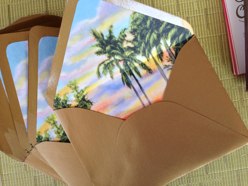  The metallic gold envelope was lined with a vintage tropical sunset scene lending just a wink of tropical kitsch.&nbsp; 