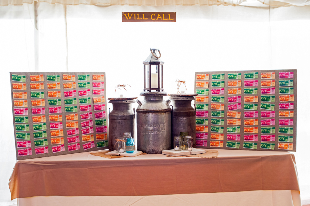 Instead of traditional escort cards we created brightly hued concert tickets for the "Will Call" station