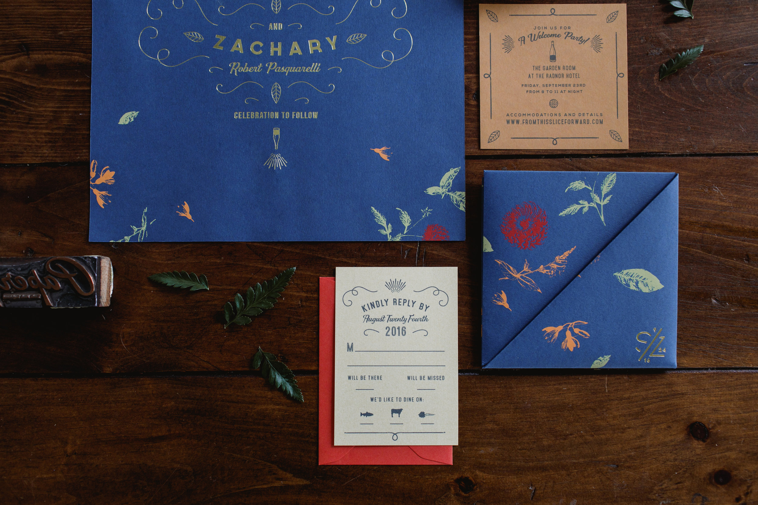 Detail of royal blue invitation suite with cream reply card for a fall wedding. 