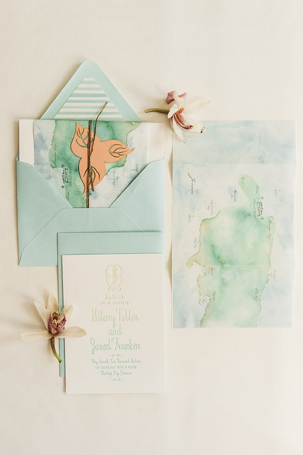 In contrast to the invitation, the save the date, was a bit more fun and colorful. Playing more off of the Caribbean destination. We printed a custom watercolored map of Jamaica on a gossamer textured paper to wrap around the save the date ca