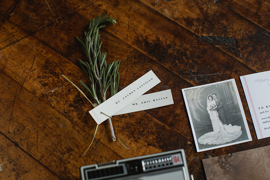  Place tags were tied to rosemary sprigs and placed on the plates at guests' seats.&nbsp; 