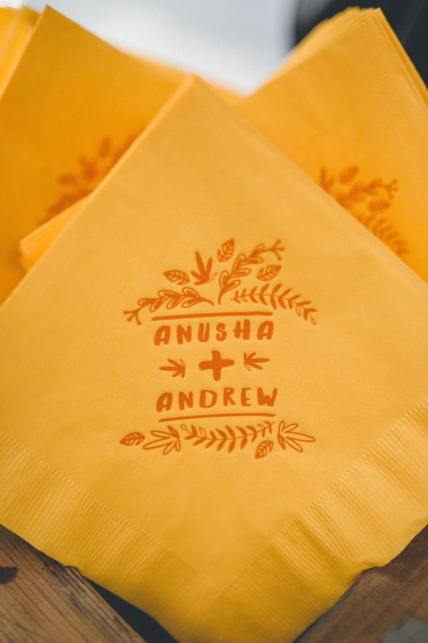  Turmeric colored napkins with the couple’s imprinted logo accompanied refreshing signature cocktails.  
