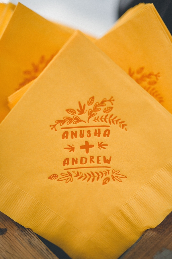 Turmeric colored napkins with the couple’s imprinted logo accompanied refreshing signature cocktails.