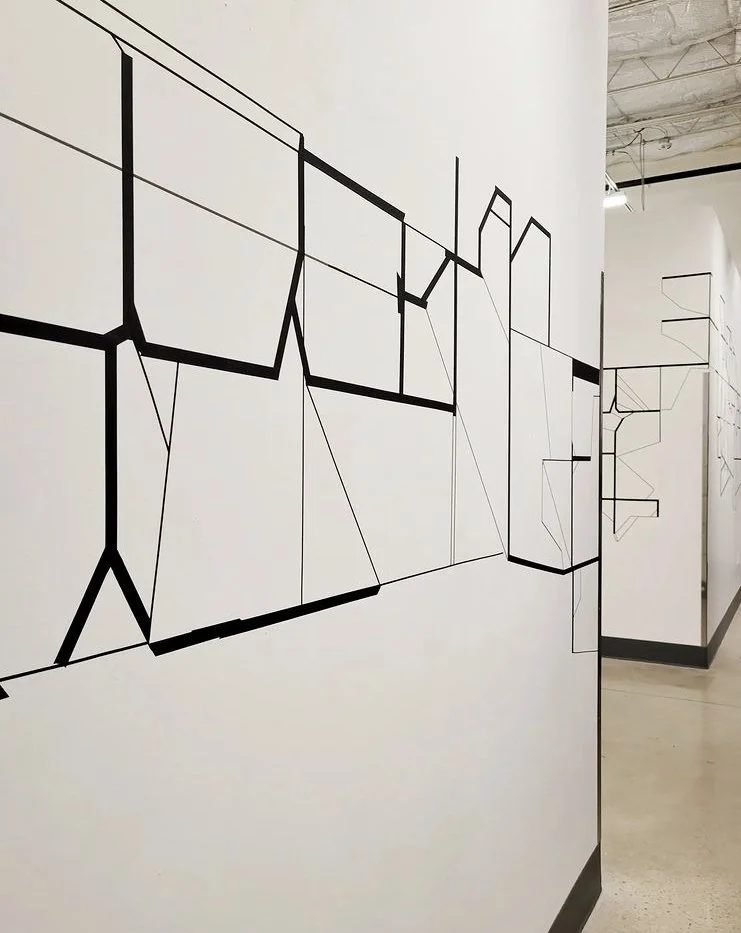 Black line geometric mural by Ramón Irwin Bonilla