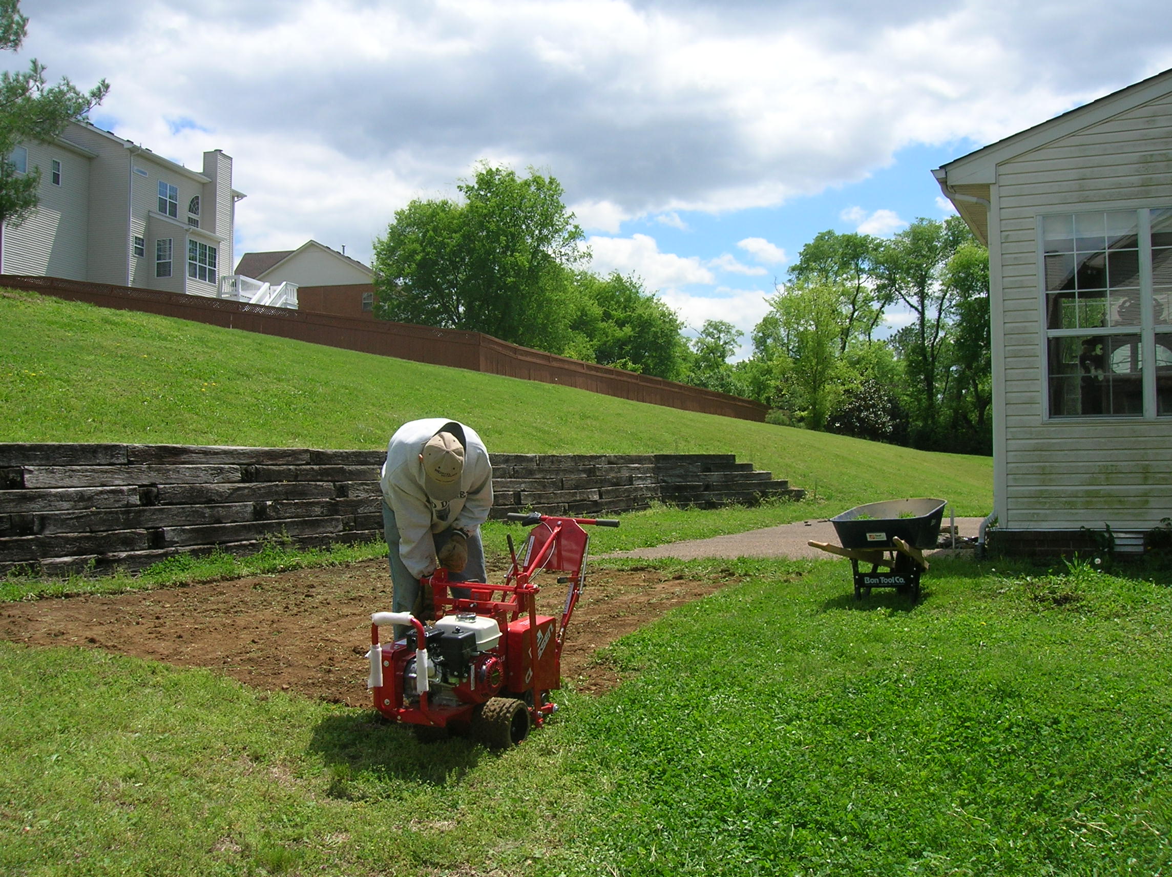 The sod getting cut out (and then bagged).