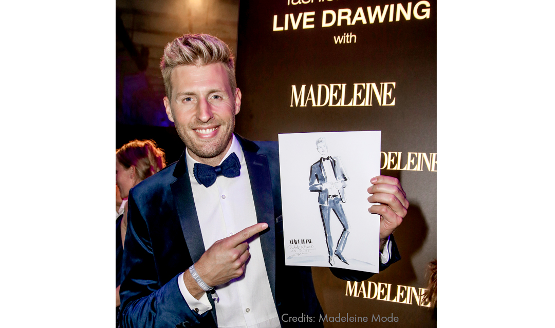 Maximilian Arland with a drawing by Virginia Romo at the Tribute to Bambi 2018