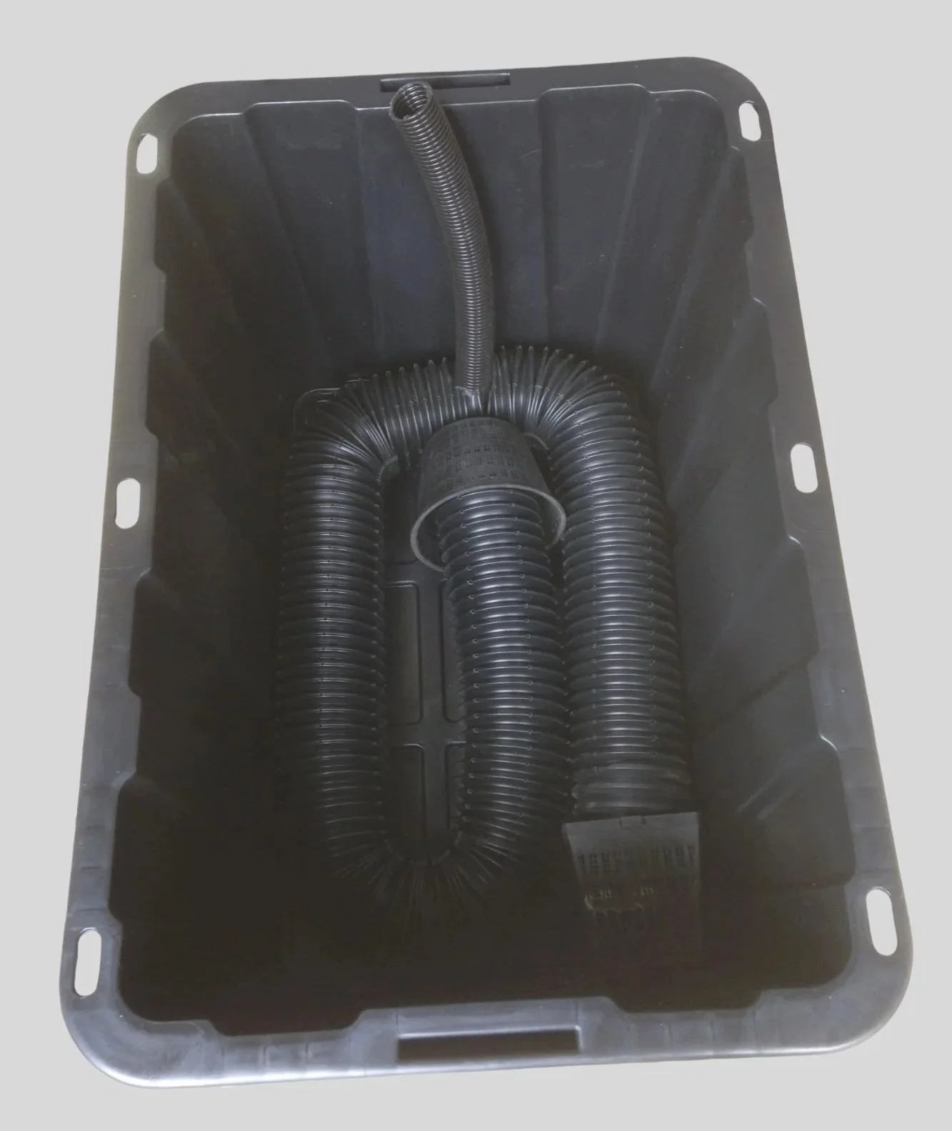 Sub-irrigated planter made from a storage tote, weeping tile, and fill tube