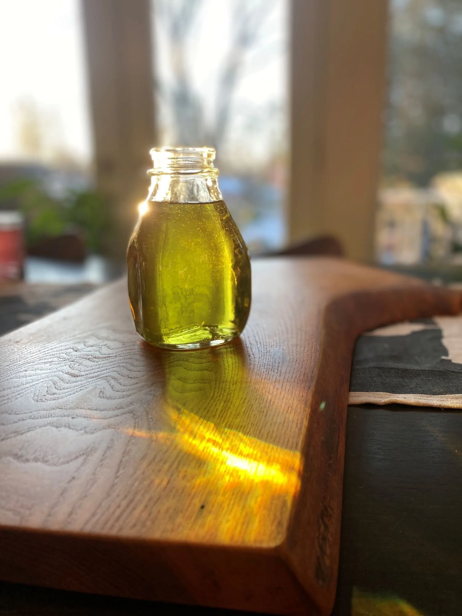 A bottle of green-tinted fig-leaf vodka.
