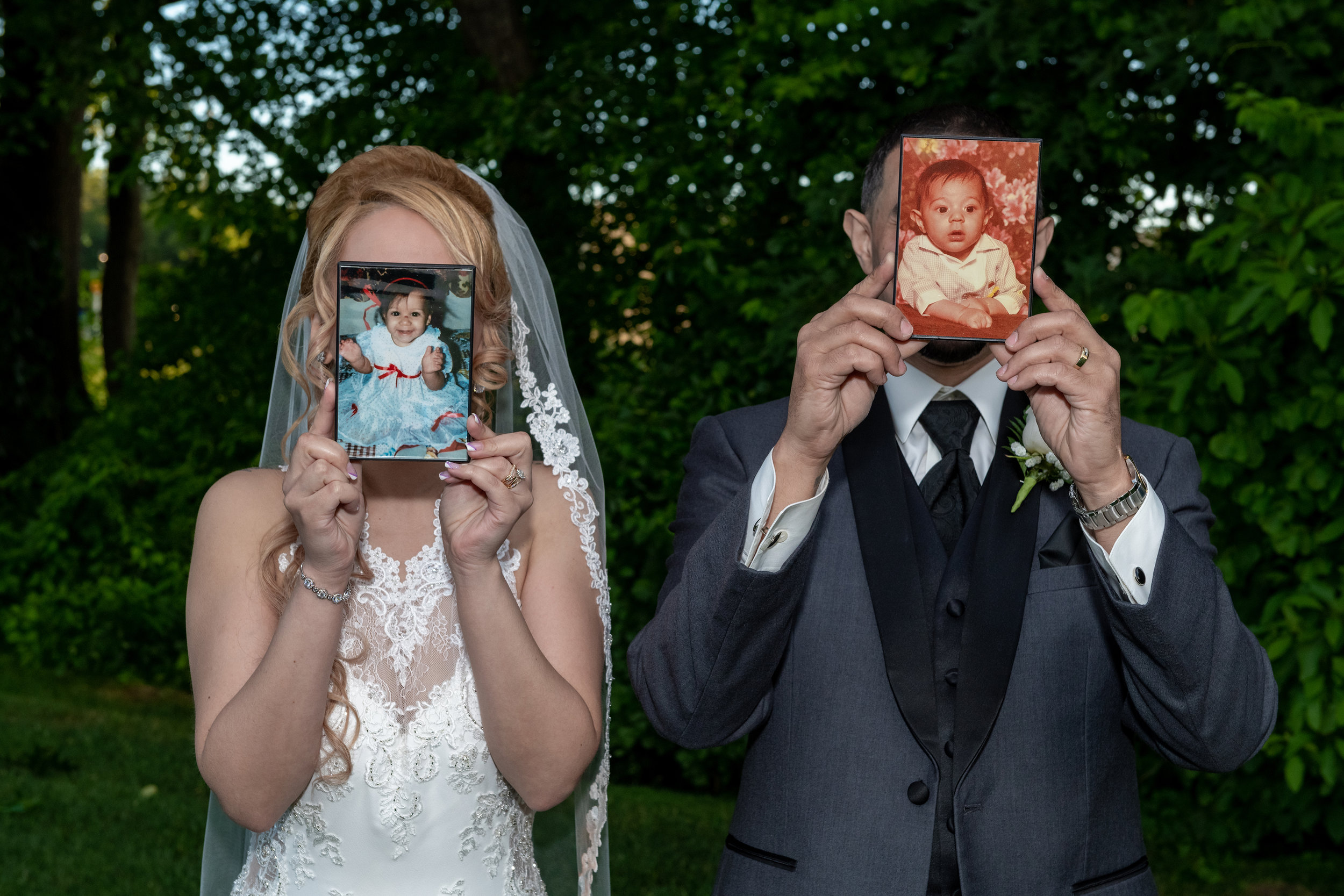 BRIDE AND GROOM WITH THEIR BABY PICTURES.jpg