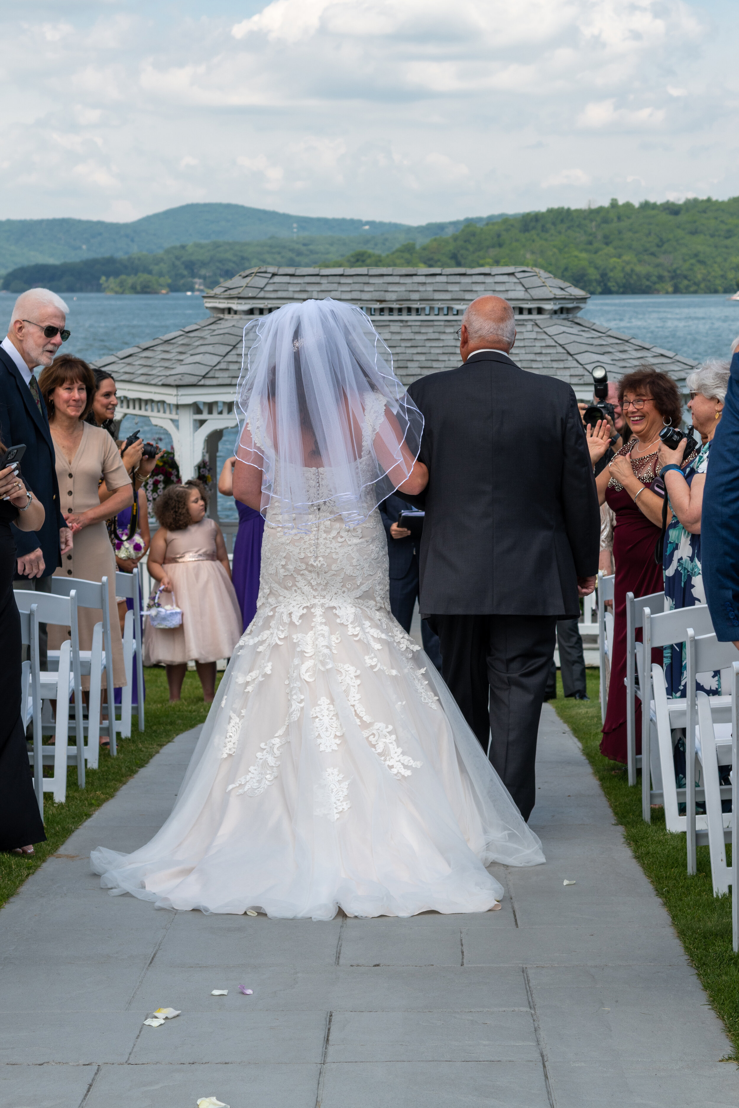 bride and dad walk down the aisle at candlewood inn.jpg