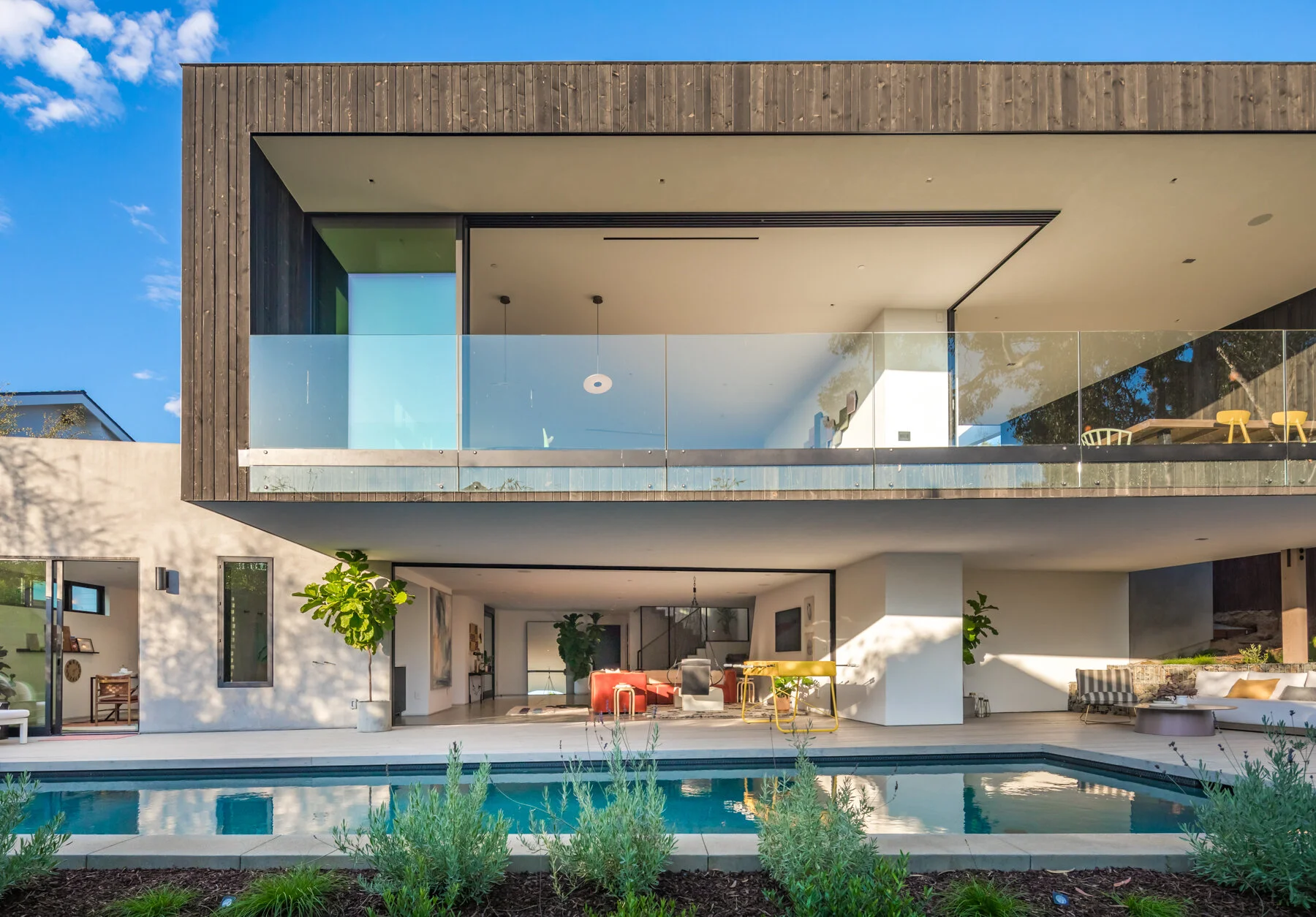  Entertaining has regained its focal point to any modern coastal home. Our twist was to allow for various independent gathering areas to function as one larger experience where the open interior floor plan and extensive outdoor areas seamlessly conne