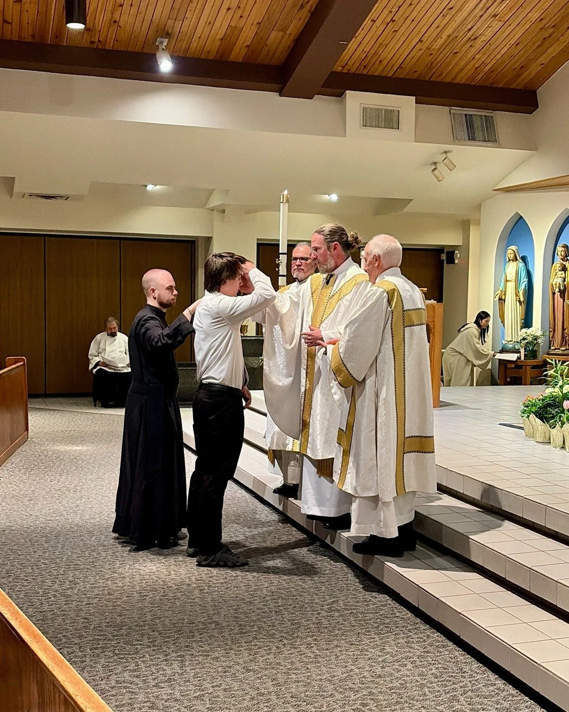 At the Easter Vigil this year, Br. Andrew sponsored one of his students from Mullen, Enrico, who was confirmed, and Br. Levi Mary sponsored one of his students from JPG, Wyatt, who was baptized. Congratulations to Enrico and Wyatt!