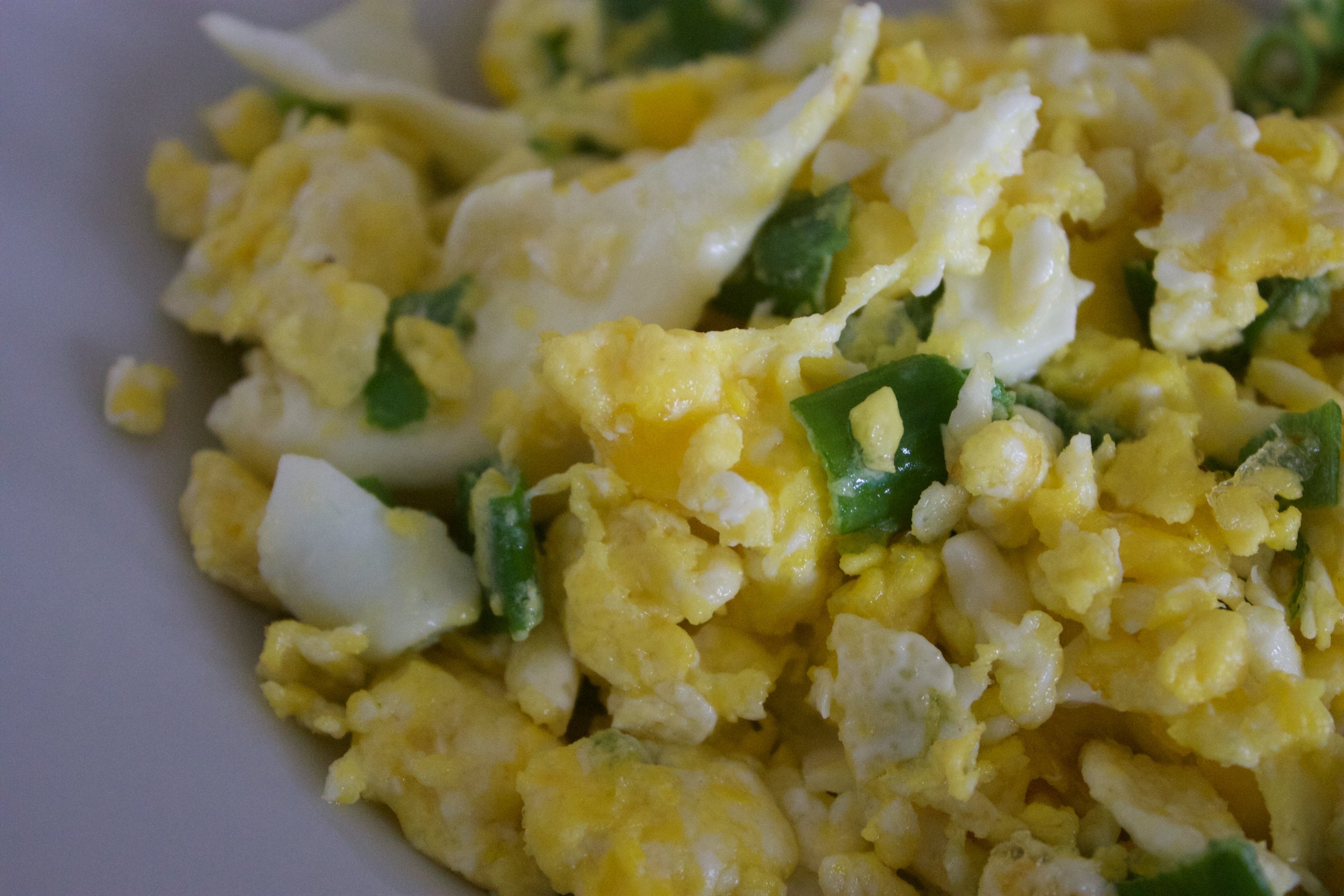 Chives and garlic greens are an easy way to add more flavor and nutrition to your scrambled eggs. 