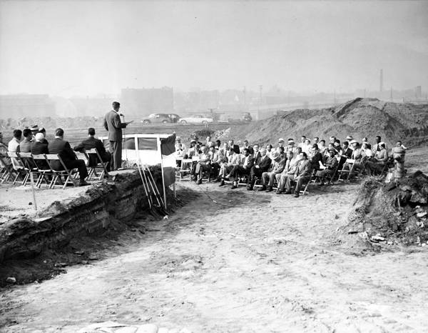 Cleveland, Ohio's civic elite at a 1955 ground breaking for a federally funded public housing project, the Woodhill Homes. Construction of the housing project enabled the city's public and private leadership to use the powers of eminent domain to evict disproportionately minority homeowners and tenants from properties considered ripe for commercial redevelopment. (Image from CSU's Cleveland Memory Project)