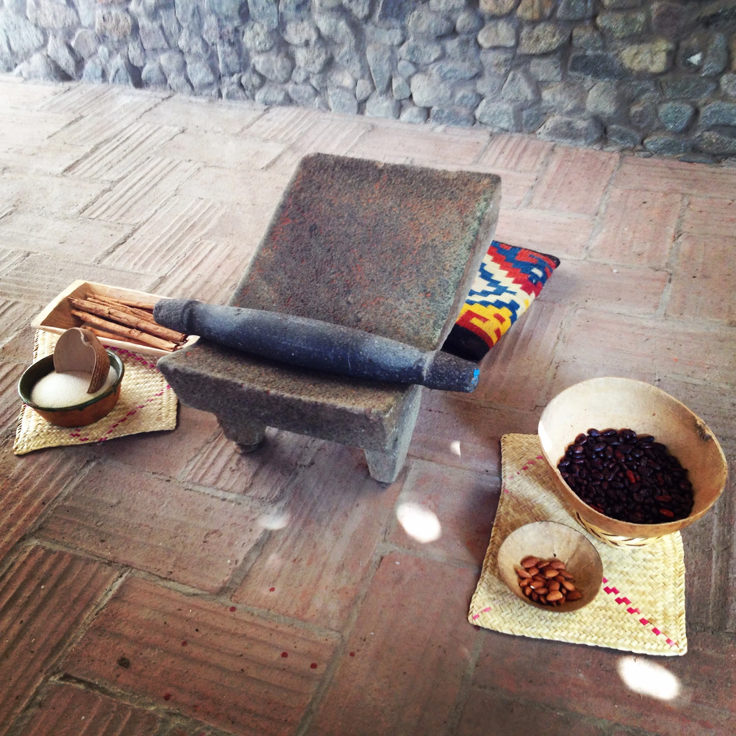 Roasted Cacao and a Matate, Used for Making Chocolate | Trillium Caterers, Belfast, Maine