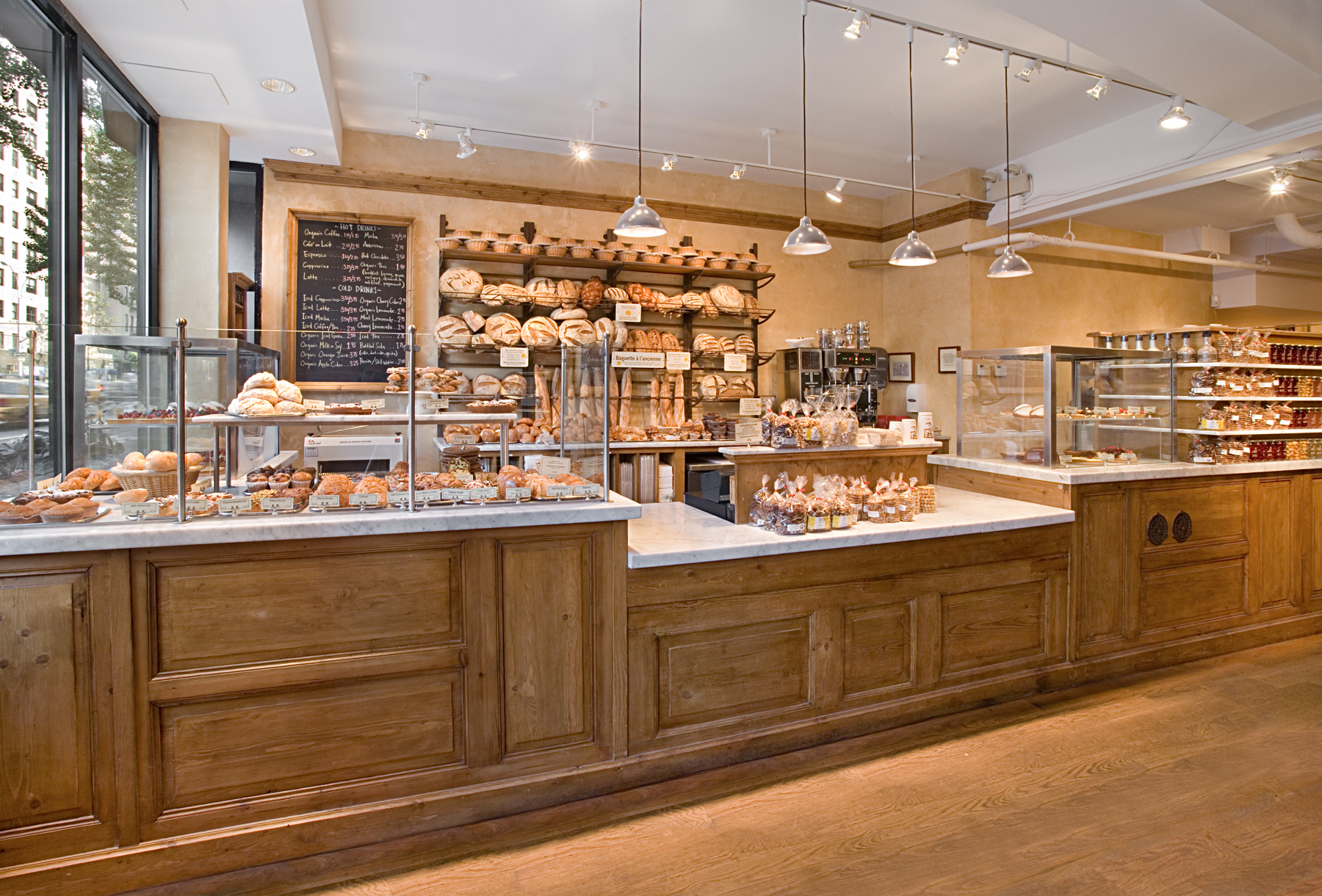 Le Pain Quotidien. Tobin Parnes Design. NYC. Hospitality Design. Restaurant. Cafe. Bakery. Millwork. Counter. Lighting.