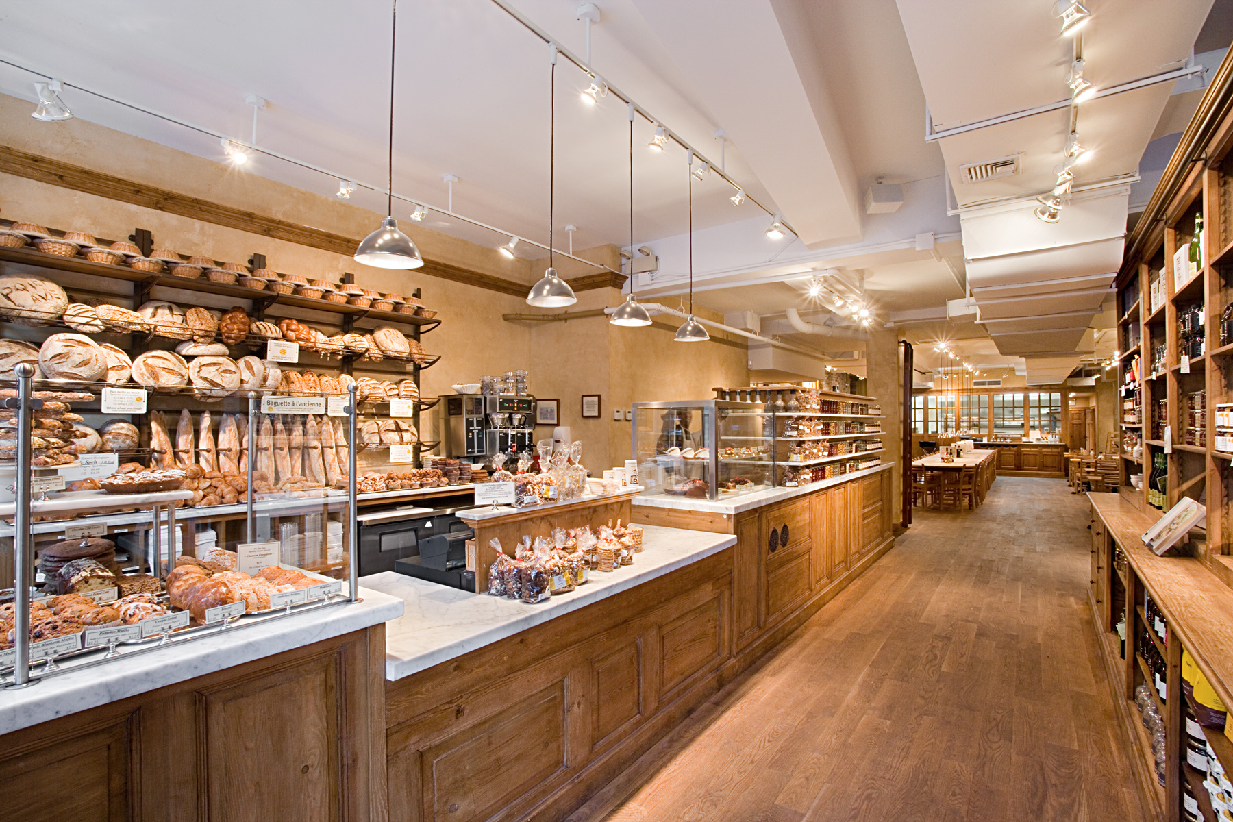 Le Pain Quotidien. Tobin Parnes Design. NYC. Hospitality Design. Restaurant. Cafe. Bakery. Counter. Millwork. Wood.