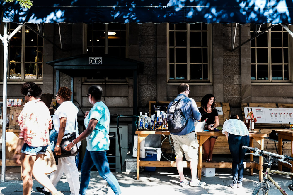 Bored in market in montreal street photography olney photographe sherbrooke