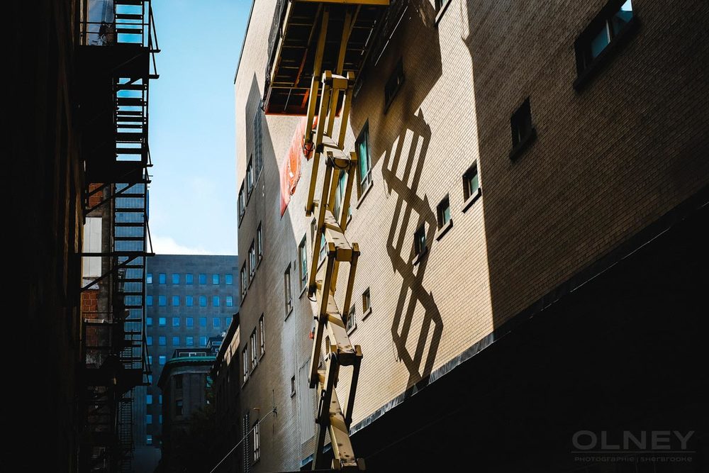 Shadows of a crane lift in Montreal