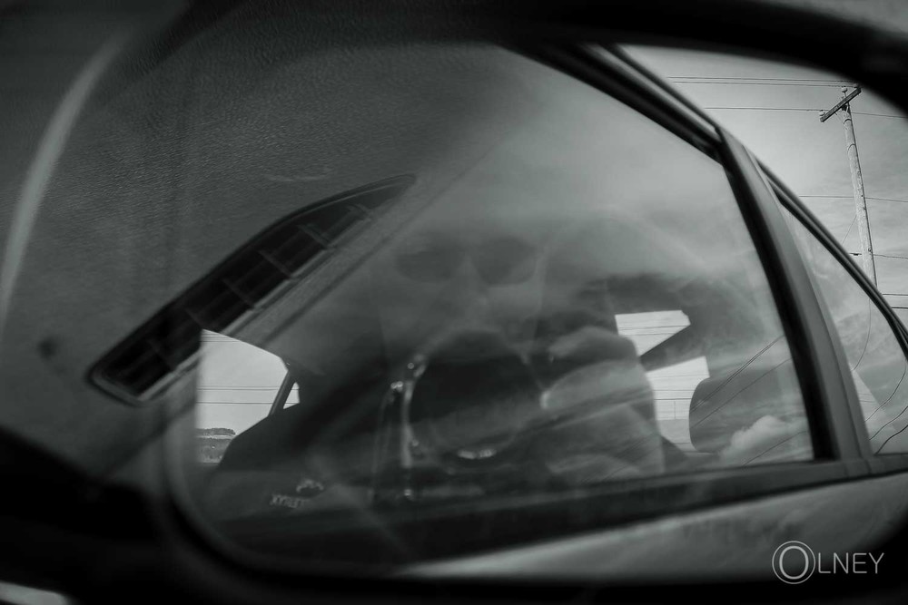 self in rear-view mirror