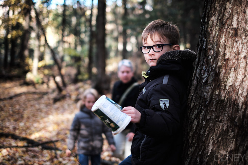 young boy portrait in the woods