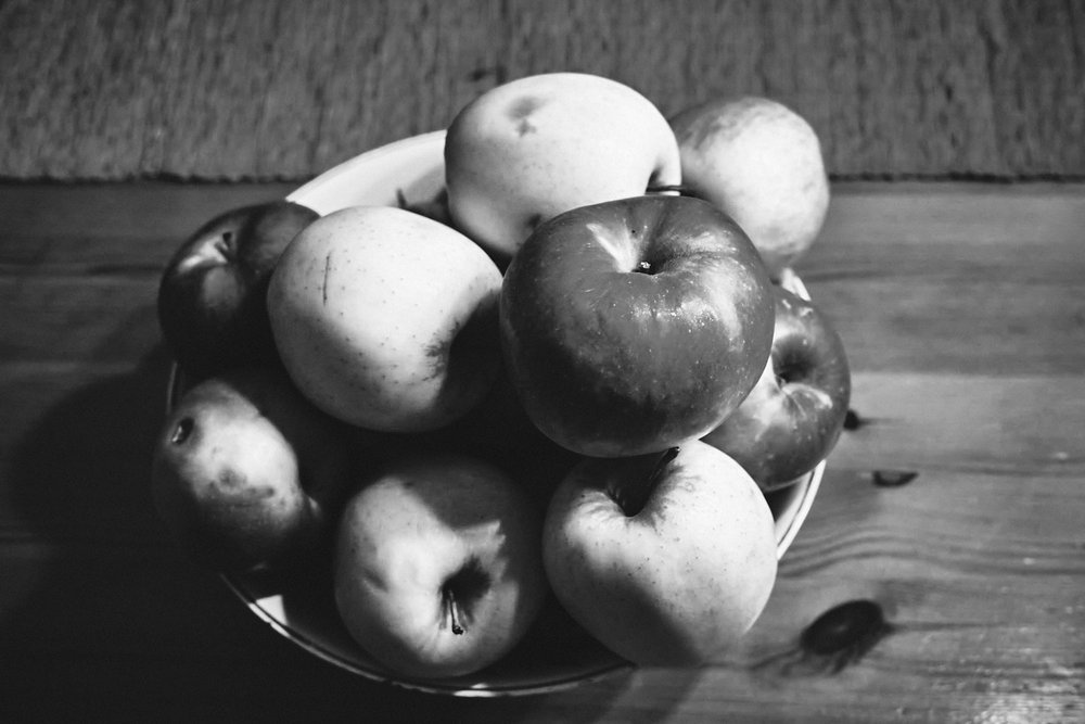 Apples on wooden table