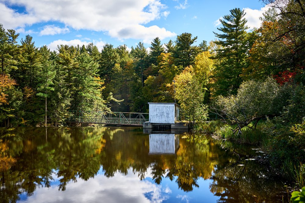 building reflecting in Watopeka River in Windsor QC