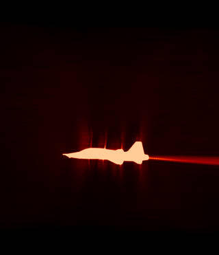 Shock waves being measured on a T-38 (Courtesy of NASA)