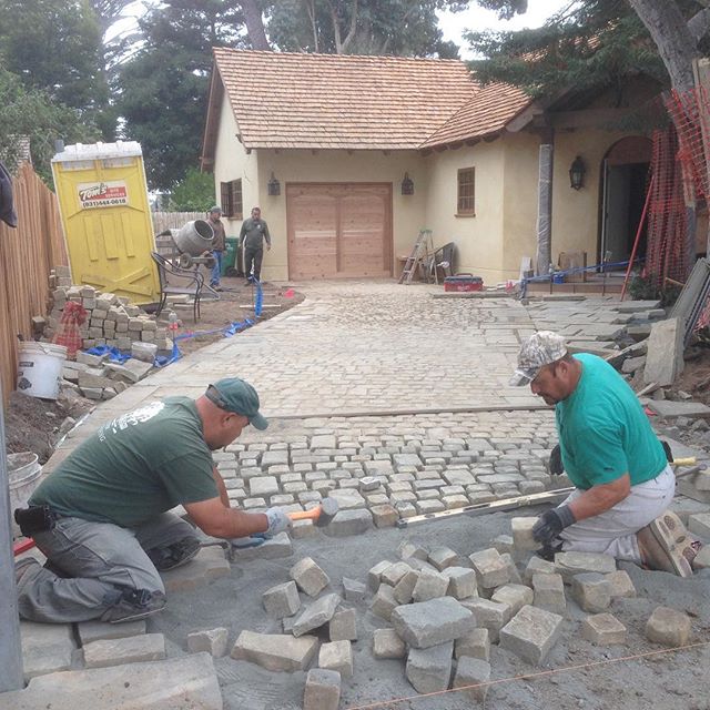Installing a cobble stone driveway in Carmel.