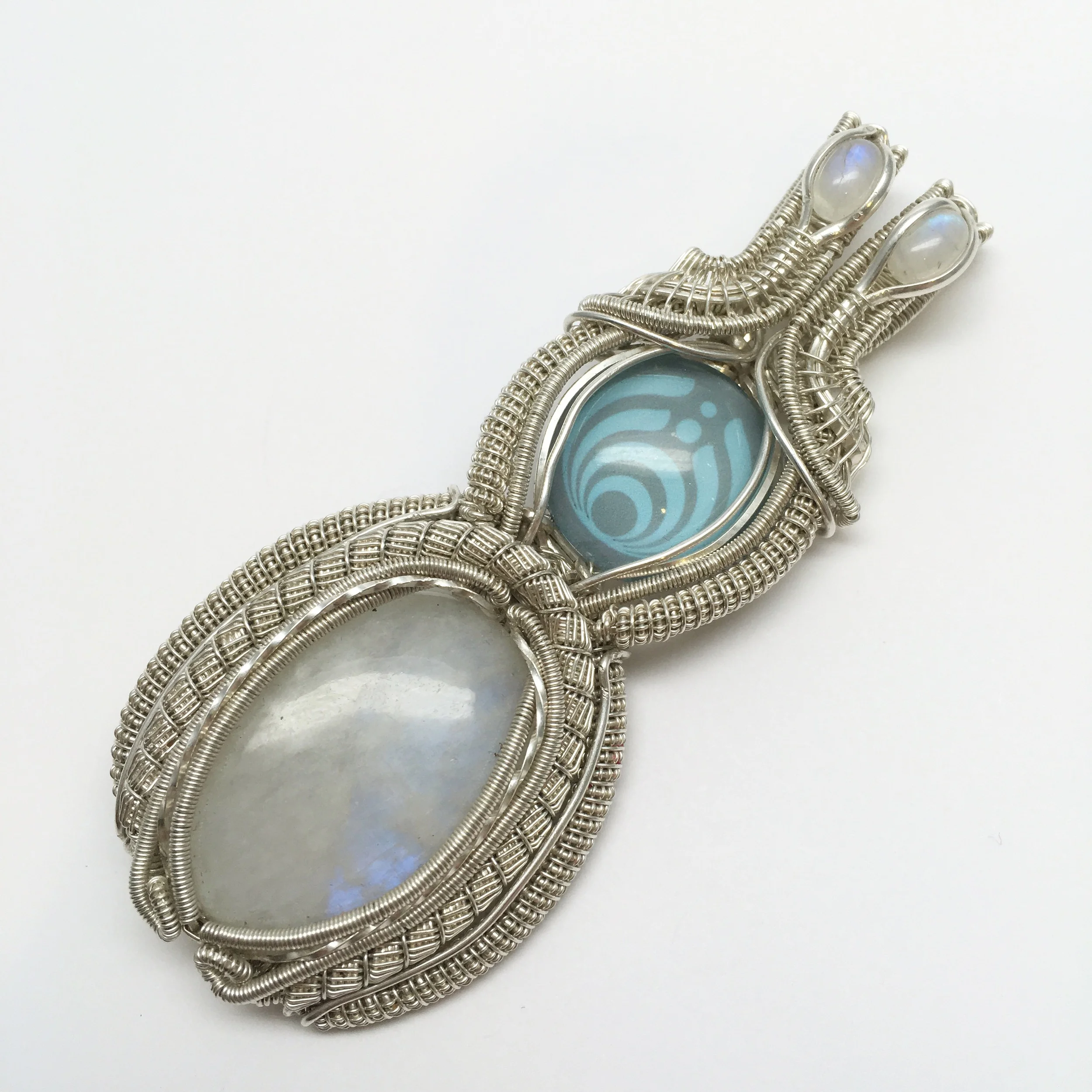 Rainbow Moonstone Wrapped in Sterling Silver