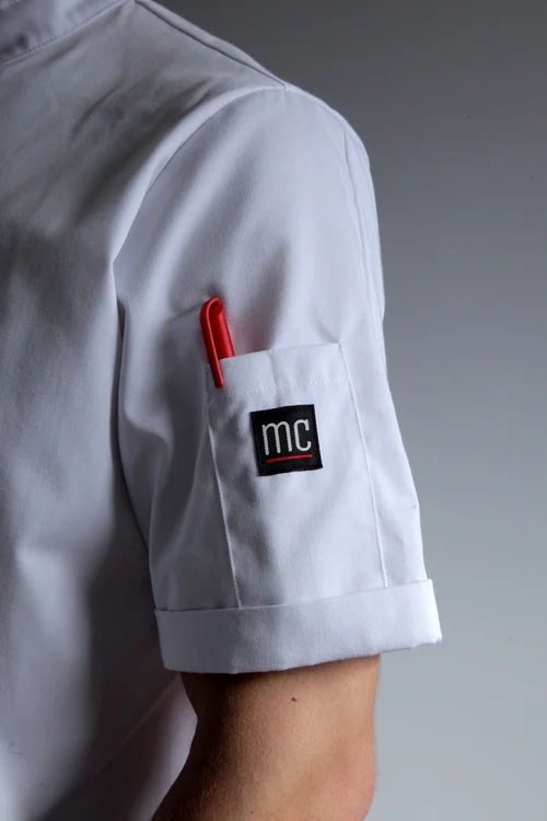 Copy of MEE-CHef_MATT_polycotton_designer_chef_coat_white_double_breasted_short_sleeved_front_chest_quality_canadian_made_MC_total_redline_standard_front_side_utility_pocket_comfort_side_view_pen