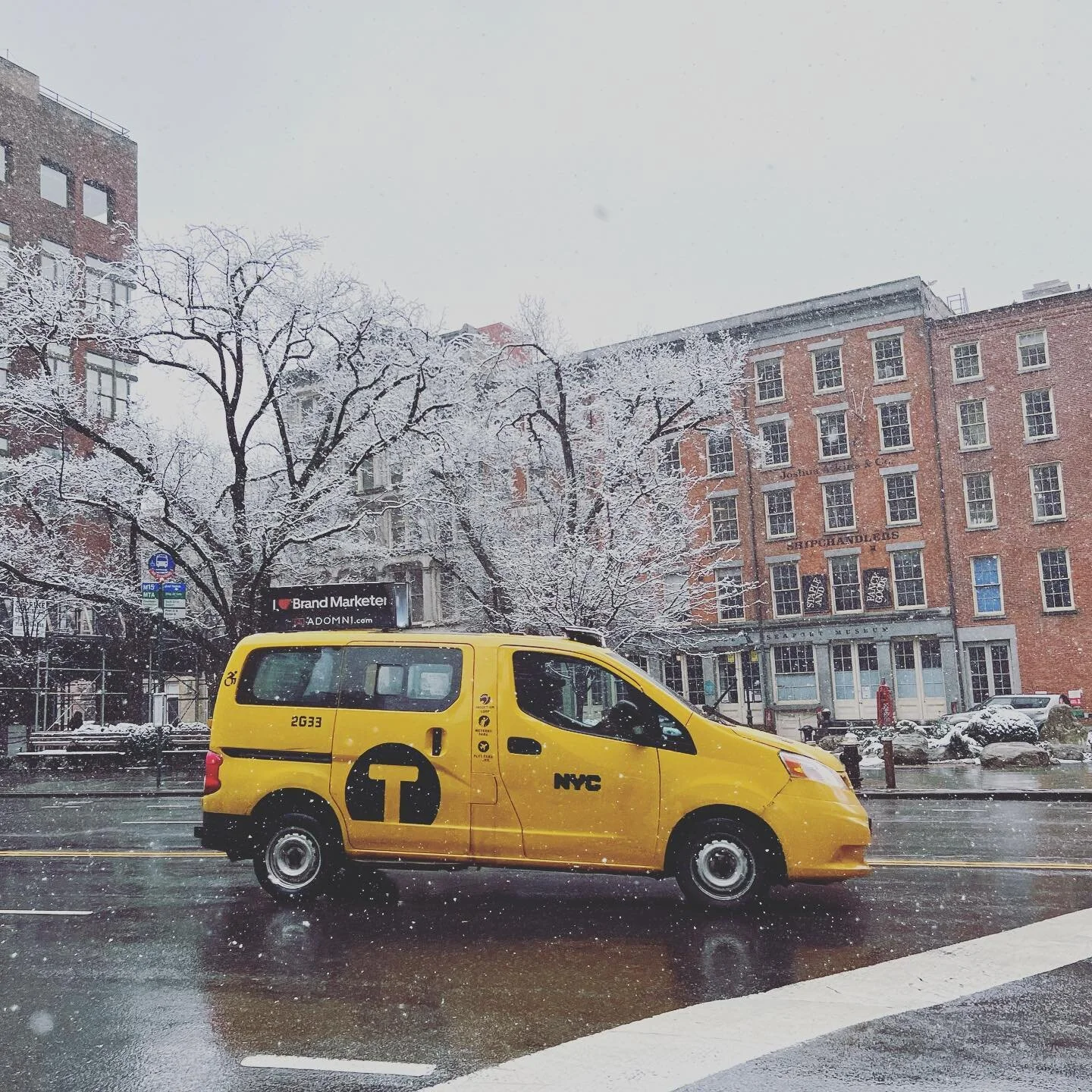 Snowy Sunday morning walk with Kona around @theseaportnyc 

#springlikesaturday to #snowysunday❄️ #nycweekends #theseaport #wallstreet #fultonstreet #yellowcab #seaportmuseum #lowermanhattan #winterinthecity #walkingthedog