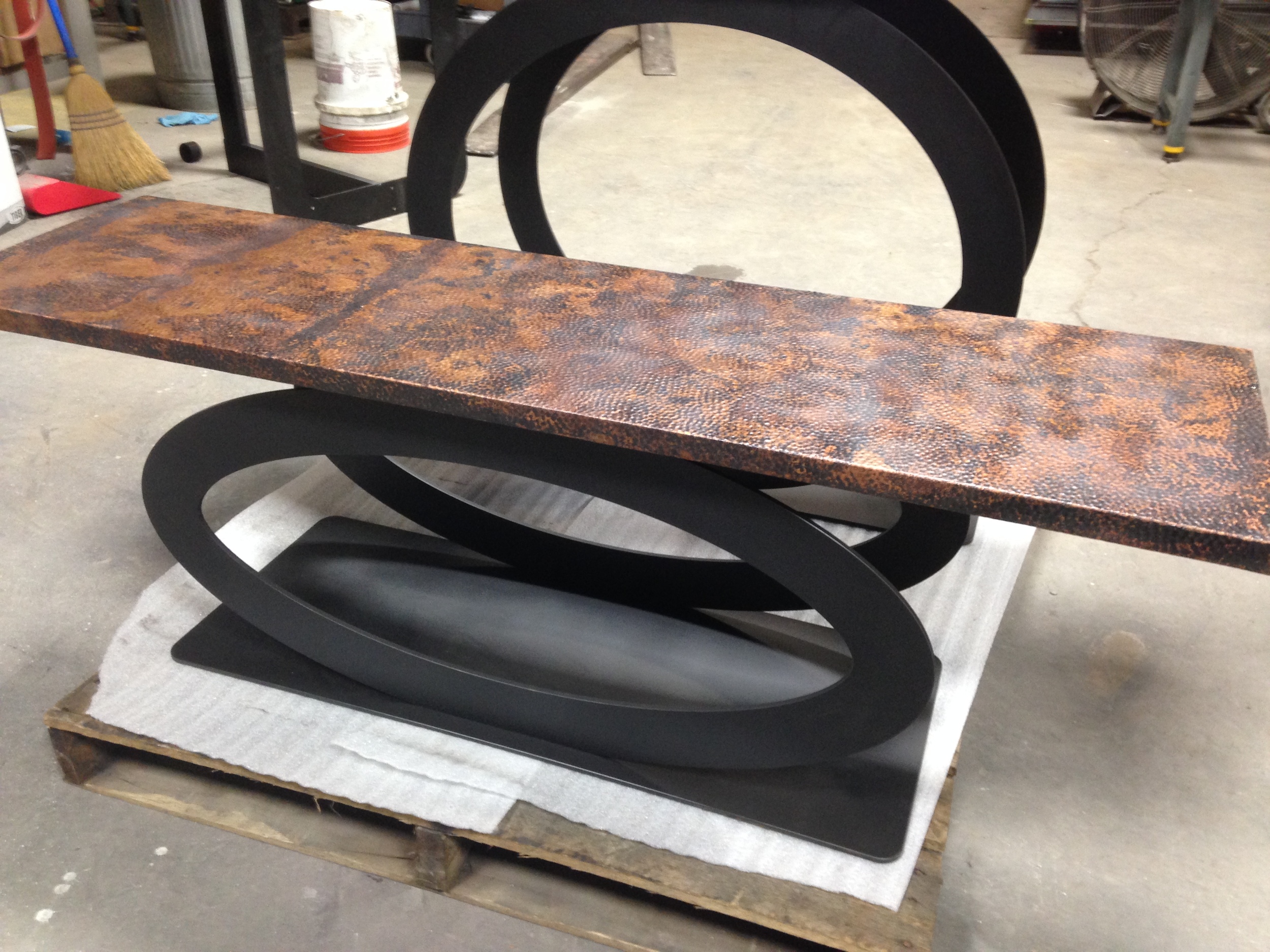 Custom hammered copper table