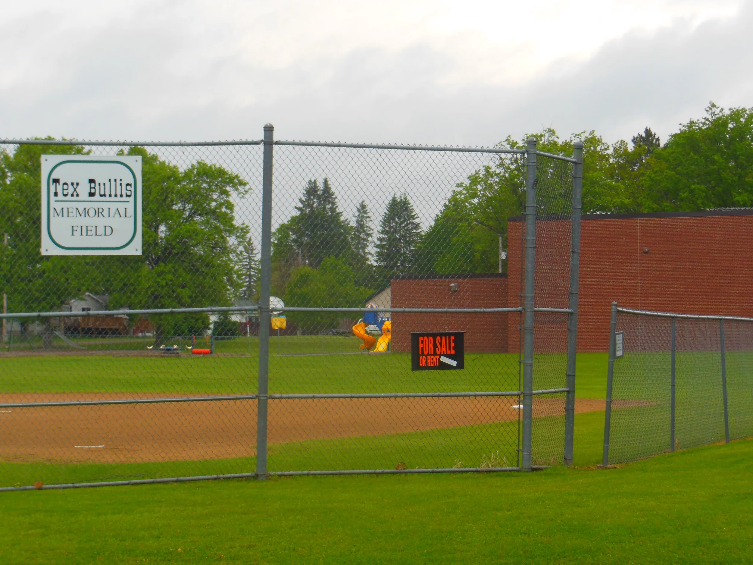 A heavy sign & saddening sign of a dying town. The freshly built school and baseball field in Palisade, MN were not enough to attract new students -- and now they are both for sale. The small town's children now ride 25 minutes to a nearby town for schooling. 