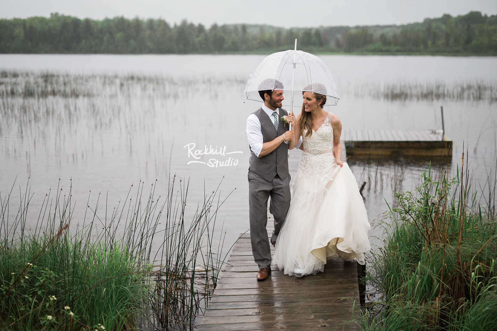 upper-peninsula-wedding-photography-rockhill-studio-newberry-rain-umbrella.jpg