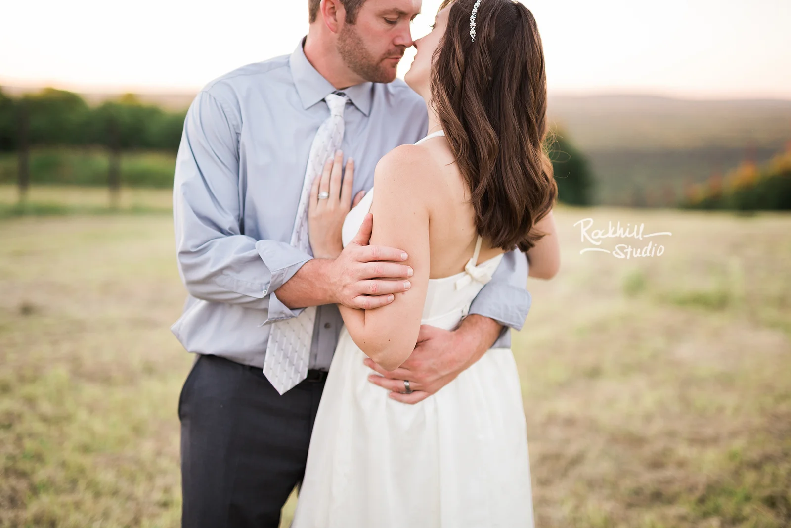traverse city wedding photographer bride and groom on ski resort at sunset