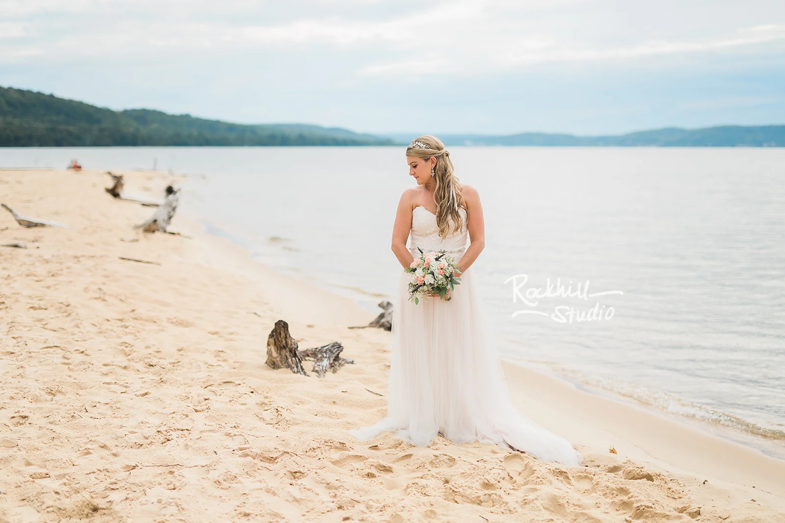 traverse city wedding photographer beach bride lake sand