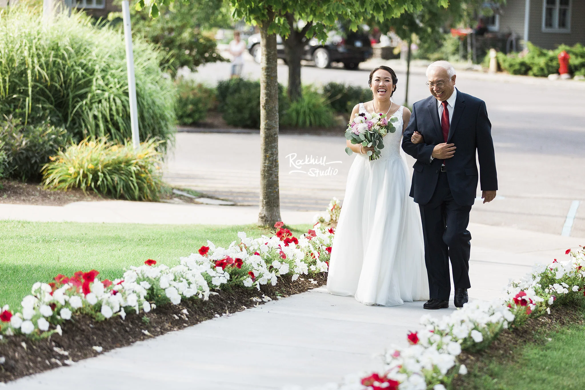 Northport wedding ceremony, bride walking down the isle, traverse city wedding photographer rockhill studio