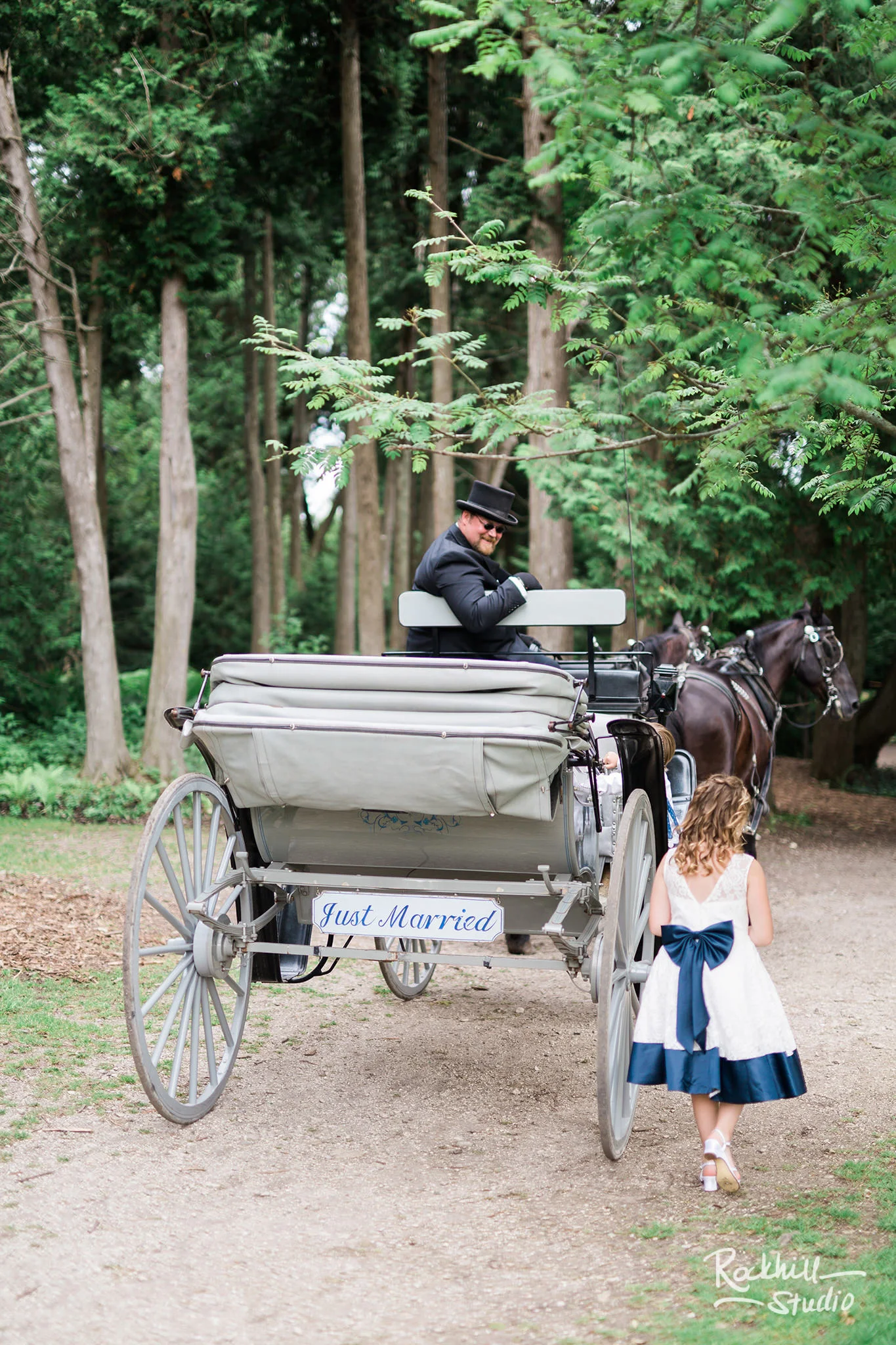 Grand Hotel Wedding, Mackinac Island horse drawn carriage, Traverse City Wedding Photographer Rockhill Studio