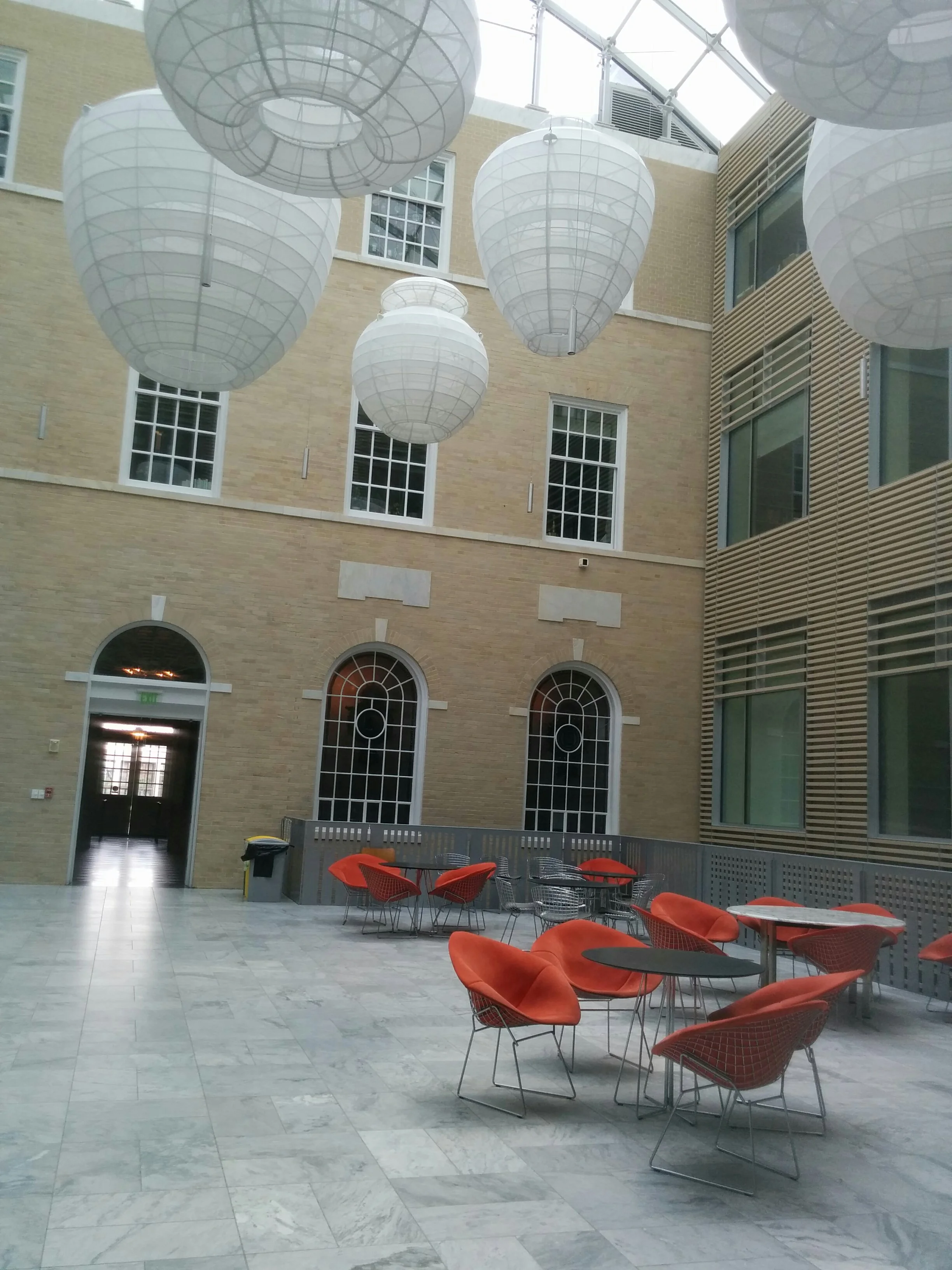A common area in Gilman Hall, home to many humanities departments and the Archaeological Museum (hence the artifact-shaped lights).