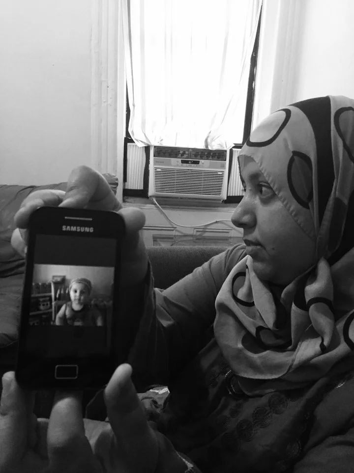 Soha shows a photo of her nephew, who is still in Homs, Syria. Purvi Thacker/ BuzzFeed News