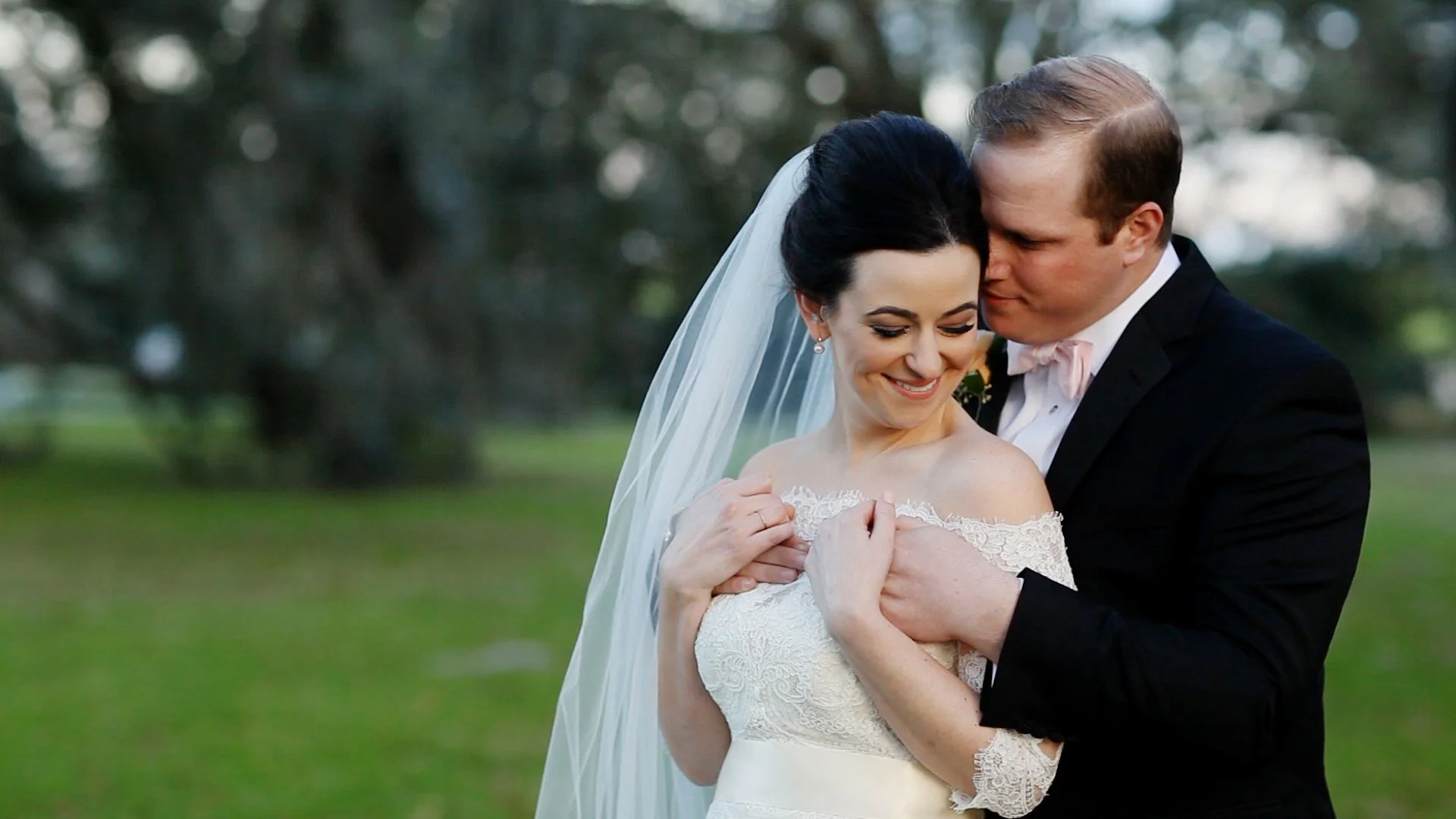 Natalie & Johnny shared a sweet moment after their Houmas House ceremony.