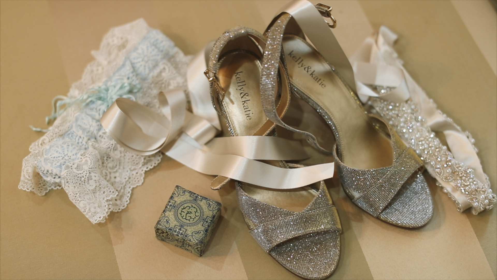 Gabby and Patrick_Bride detail shot garter and shoes