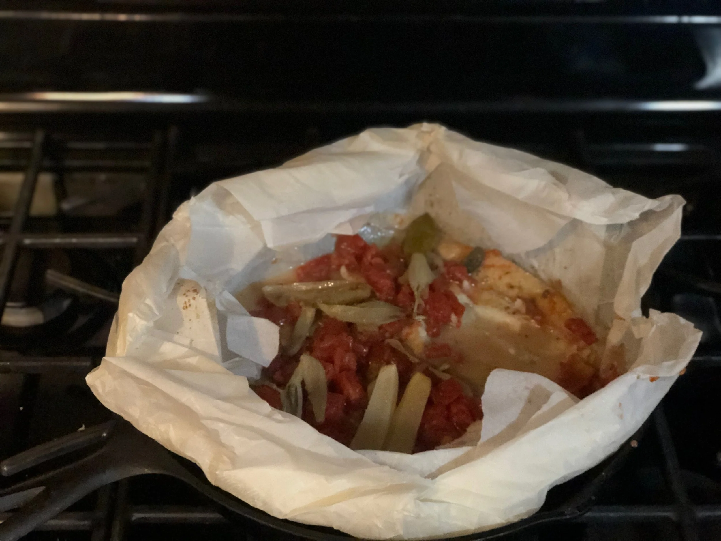 Increasing quantity and variety of plants in my cooking. Here: a bit of white fish with tomatoes, shallots and fennel.